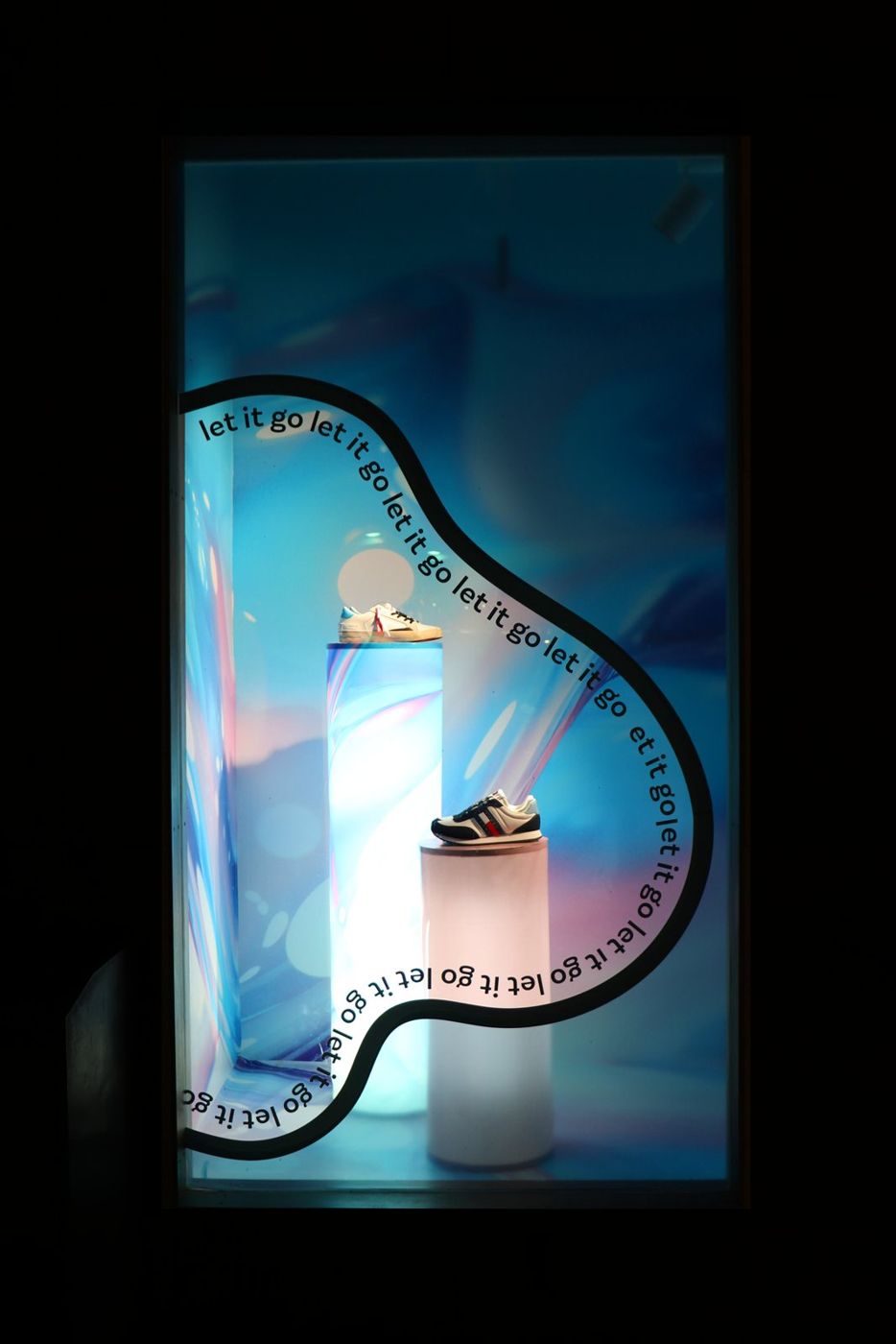 Sneakers on glowing plinths