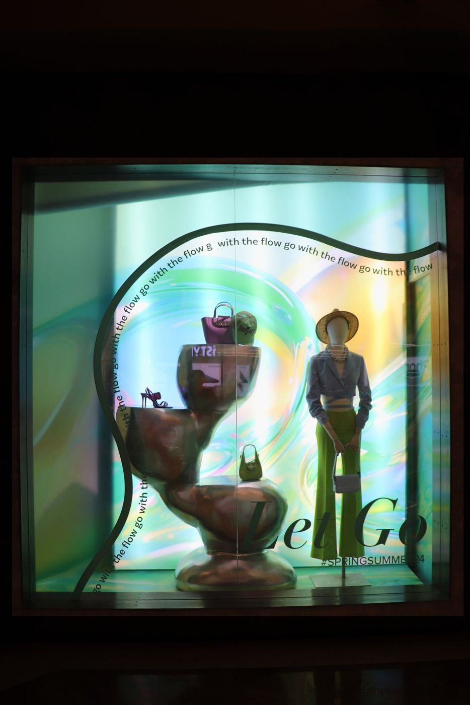 Let Go window with iridescent backdrop