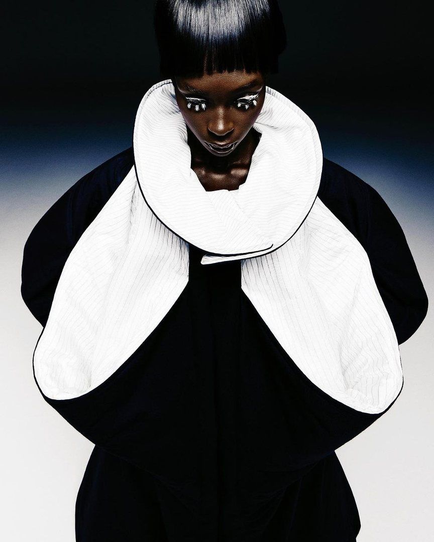 Editorial styling, sculptural white collar
