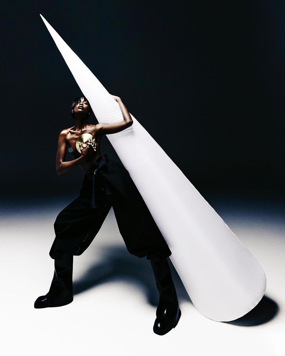 Model with an inflatable white cone